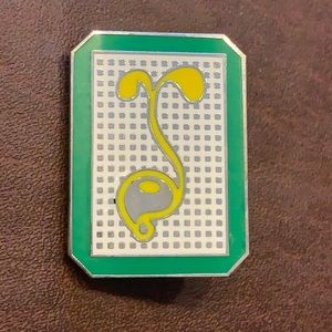 Oil slick X grassroots hat pin